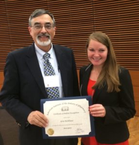 AIHP Executive Director Greg Higby awards an Student Recognition Certificate to 2015