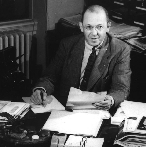 Robert P. Fischelis, Executive Secretary of the APhA, at his desk in the late 1940s.
