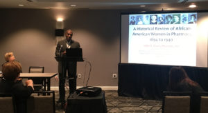 John Clark's presentation about the history of African-American women in pharmacy. (Photo courtesy of Naomi Rendina)