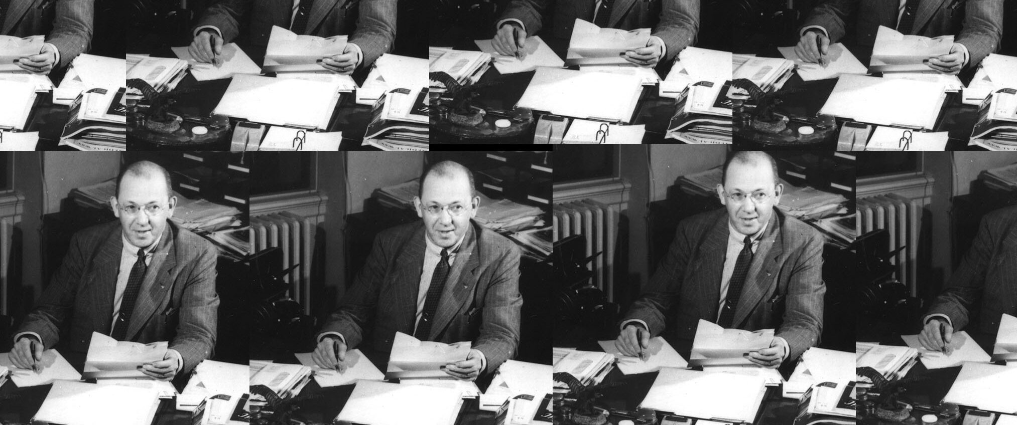 Robert P. Fischelis, Executive Secretary of the APhA, at his desk in the late 1940s.
